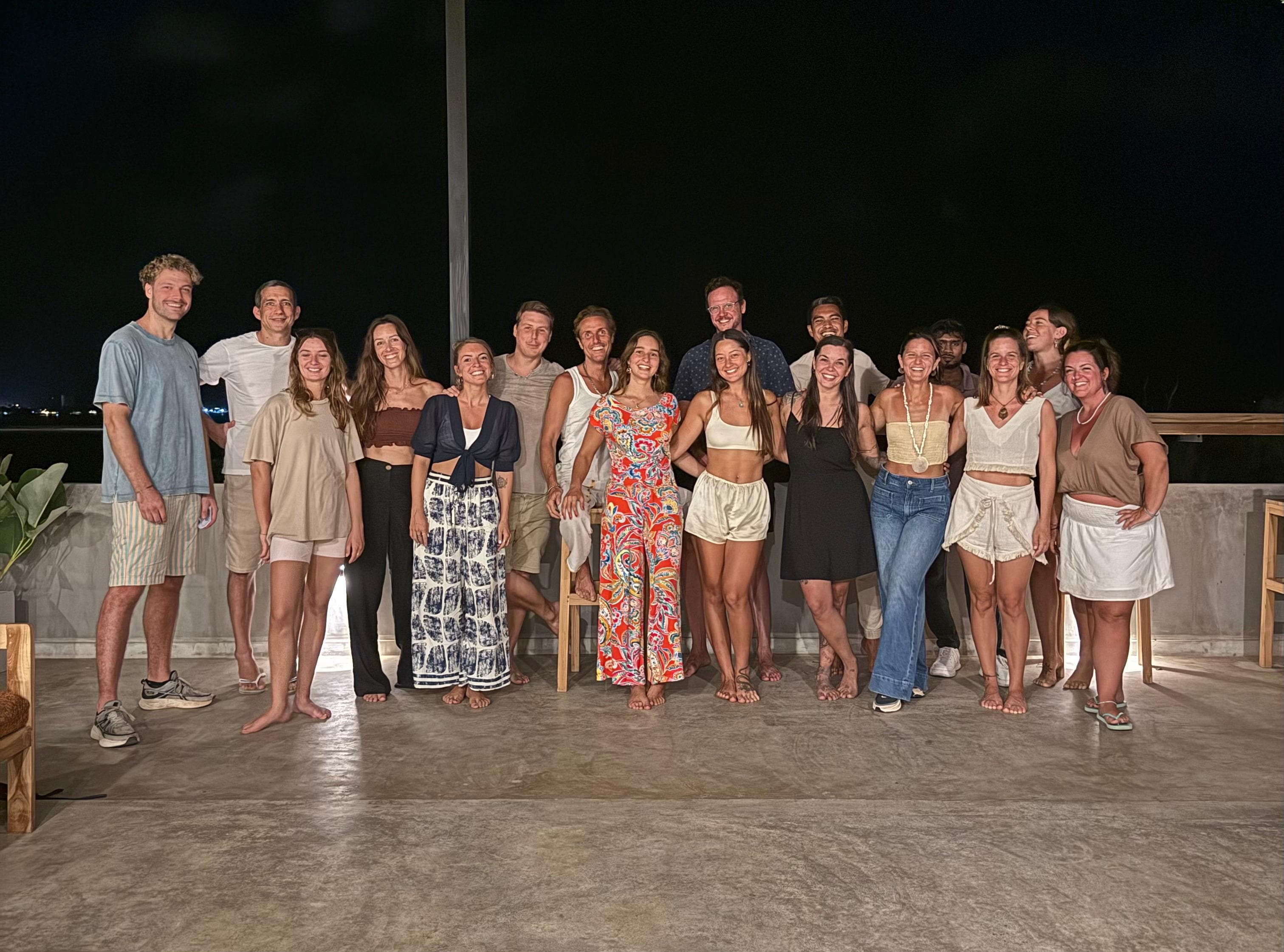 A long-stay community gathered for a group photo
